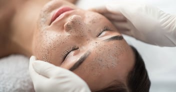 close up of woman getting exfoliation treatment