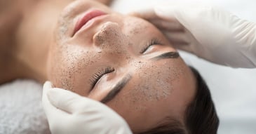 close up of woman getting exfoliation treatment