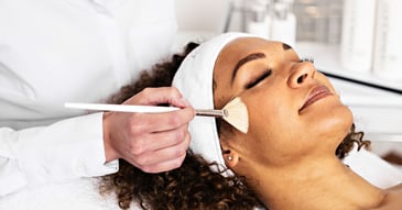 lactic acid resurfacer being applied to patients face