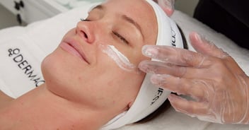 patient receiving facial treatment from dermaquest specialist