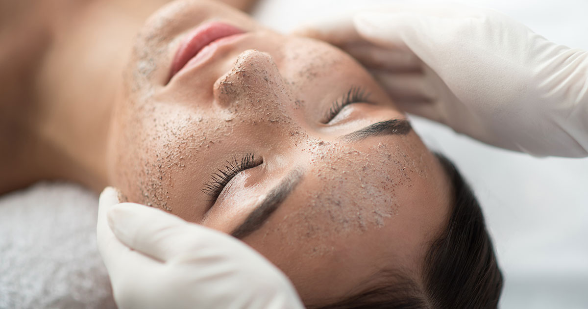 close up of woman getting exfoliation treatment